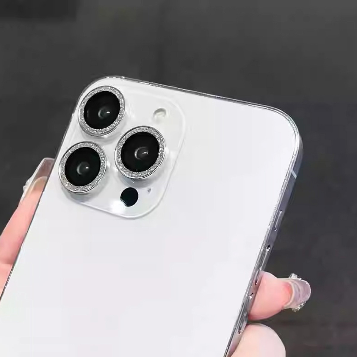 High Definition Visual Experience: Made of ultra-thin tempered glass, providing a high-definition visual experience and ensuring clear photos.
Explosion-proof and Dust-proof: Features explosion-proof properties to prevent lens breakage and dust-proof design to keep the lens clean.
Fingerprint-resistant: Special coating reduces fingerprint residue, keeping the lens clear.
Easy Installation: Comes with installation tools, including wet and dry wipes and a dust-absorber, ensuring easy application.
Multi-layer Protection: Includes sapphire coating, soft fiber layer, fall protection layer, heightened hydraulic layer, and high permeability glass layer for comprehensive protection.
Retail Packaging: Suitable for retail sales, packaging includes all necessary installation items., Glitter Camera Lens Tempered Glass Protector for iPhone 16/ 16 Plus - Black