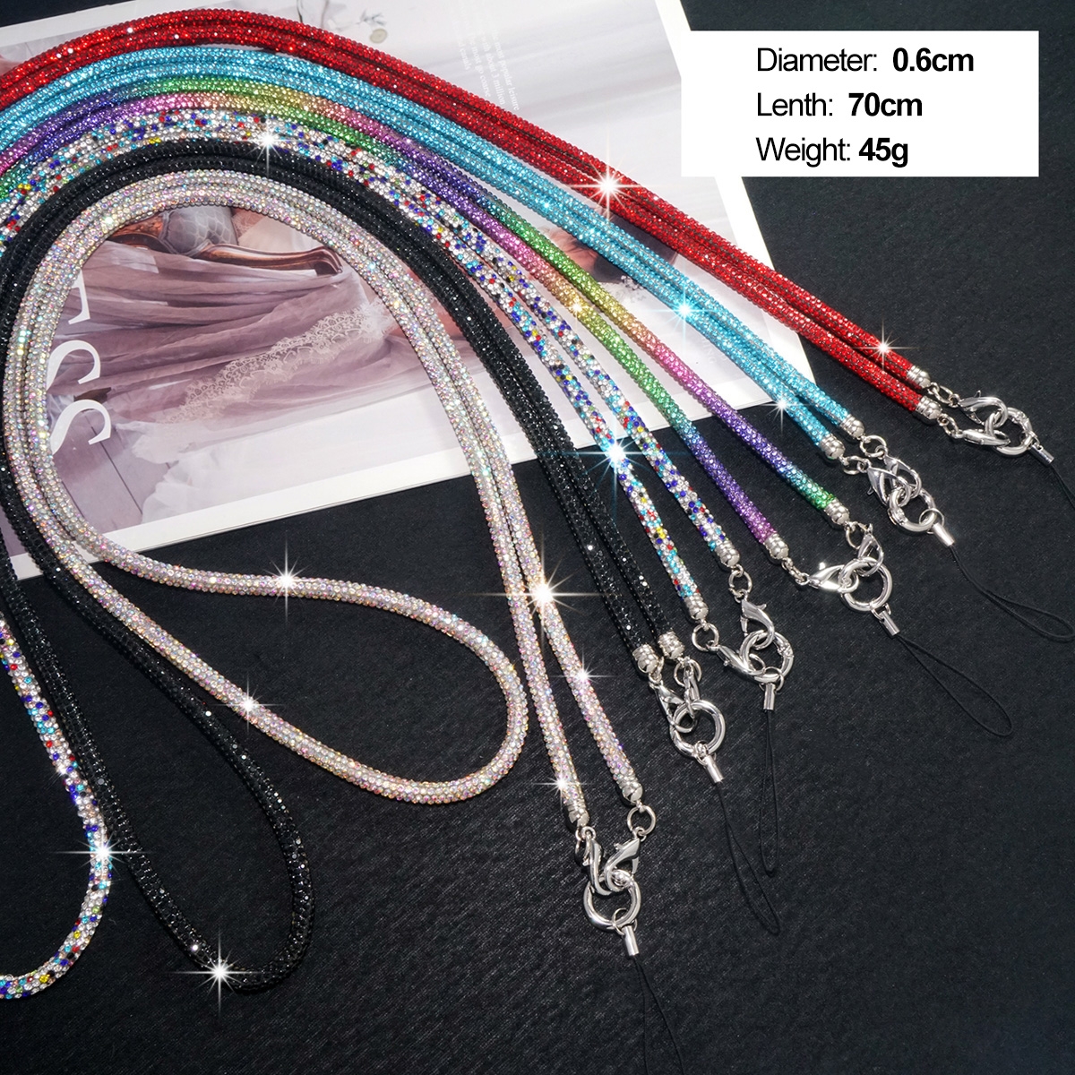 Colorful Options: Available in a variety of colors including rainbow, multicolor, blue, Chinese red, gold, black and white, red, and purple, perfect for showing personal style.
Premium Materials: Made with alloy metal clasps and high-elastic cotton straps for durability and comfort.
Handcrafted: Each piece is meticulously handcrafted, with attention to detail that speaks to quality.
Practical Design: Featuring a diamond-studded crossbody chain with a diameter of 0.6cm, folded length of about 70cm, and weighing only about 45g, it